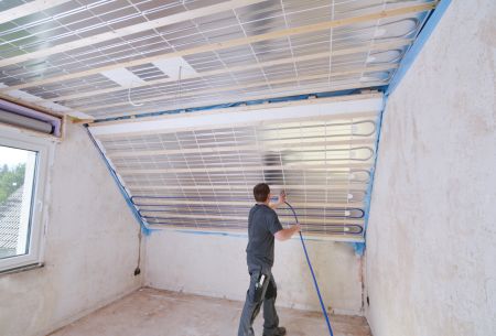 Straight-line routing of the system pipe through the pipe guides of the heating elements.
